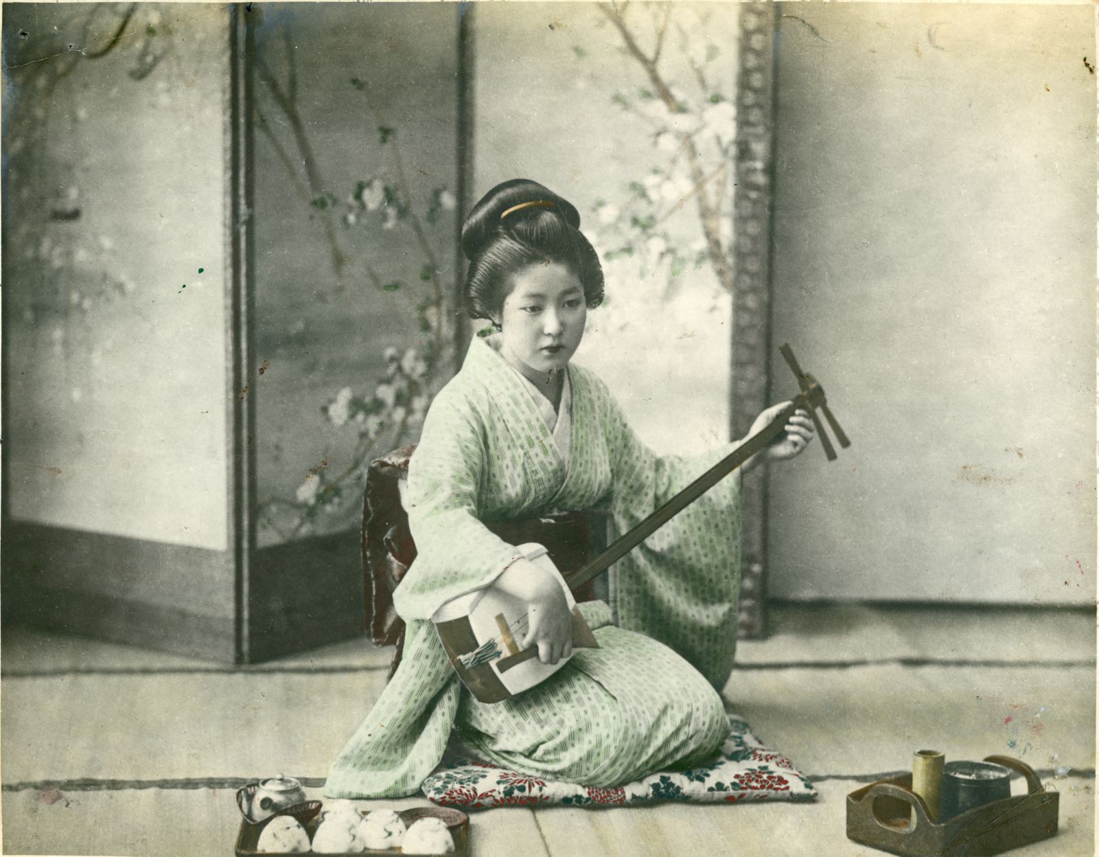 Japanese woman playing a shamisen unknown photographer Yokohama shashin print 1890-1920 National Trust for Scotland Broughton House