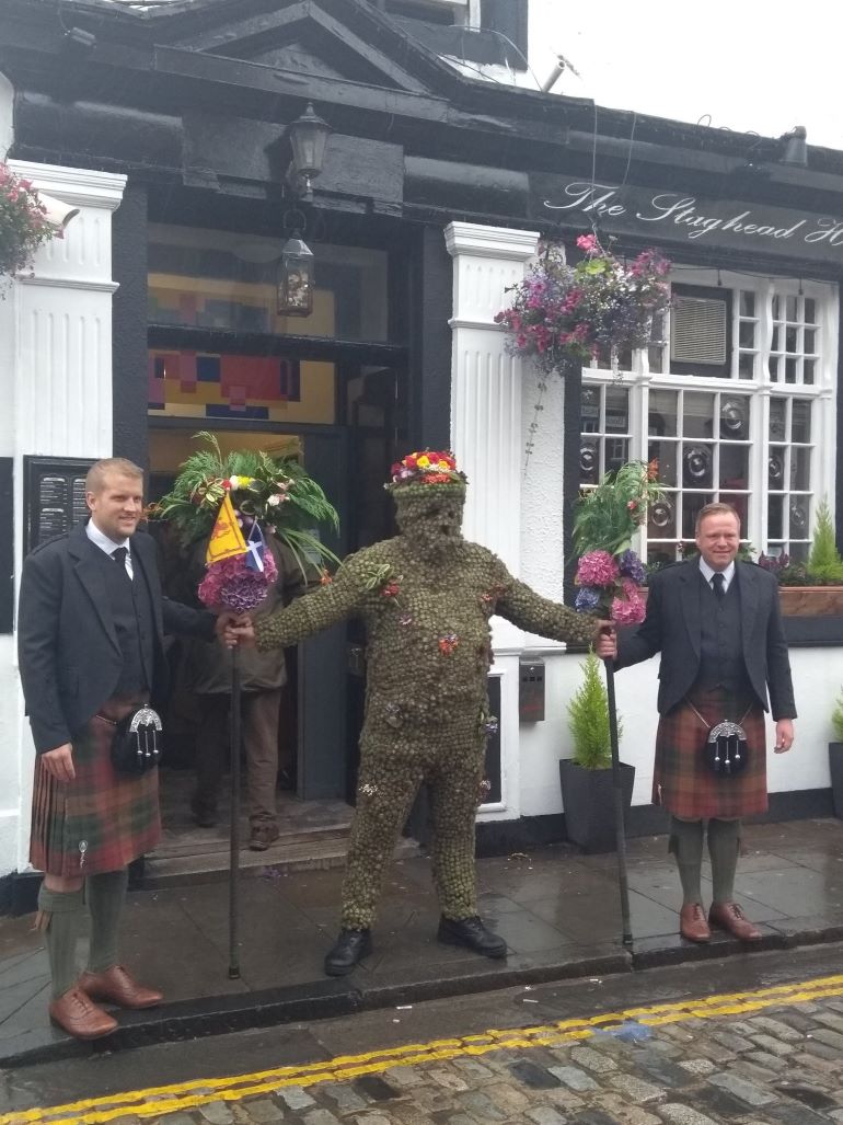 The Burryman leaving the Stag Head Hotel in 2019