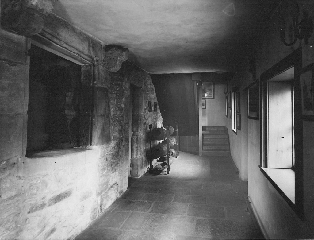 A view of the ground floor of Huntly House Museum in the 1930s. The elm wooden water pipes seen here are now in the first floor gallery. © The City of Edinburgh Council Museums & Galleries