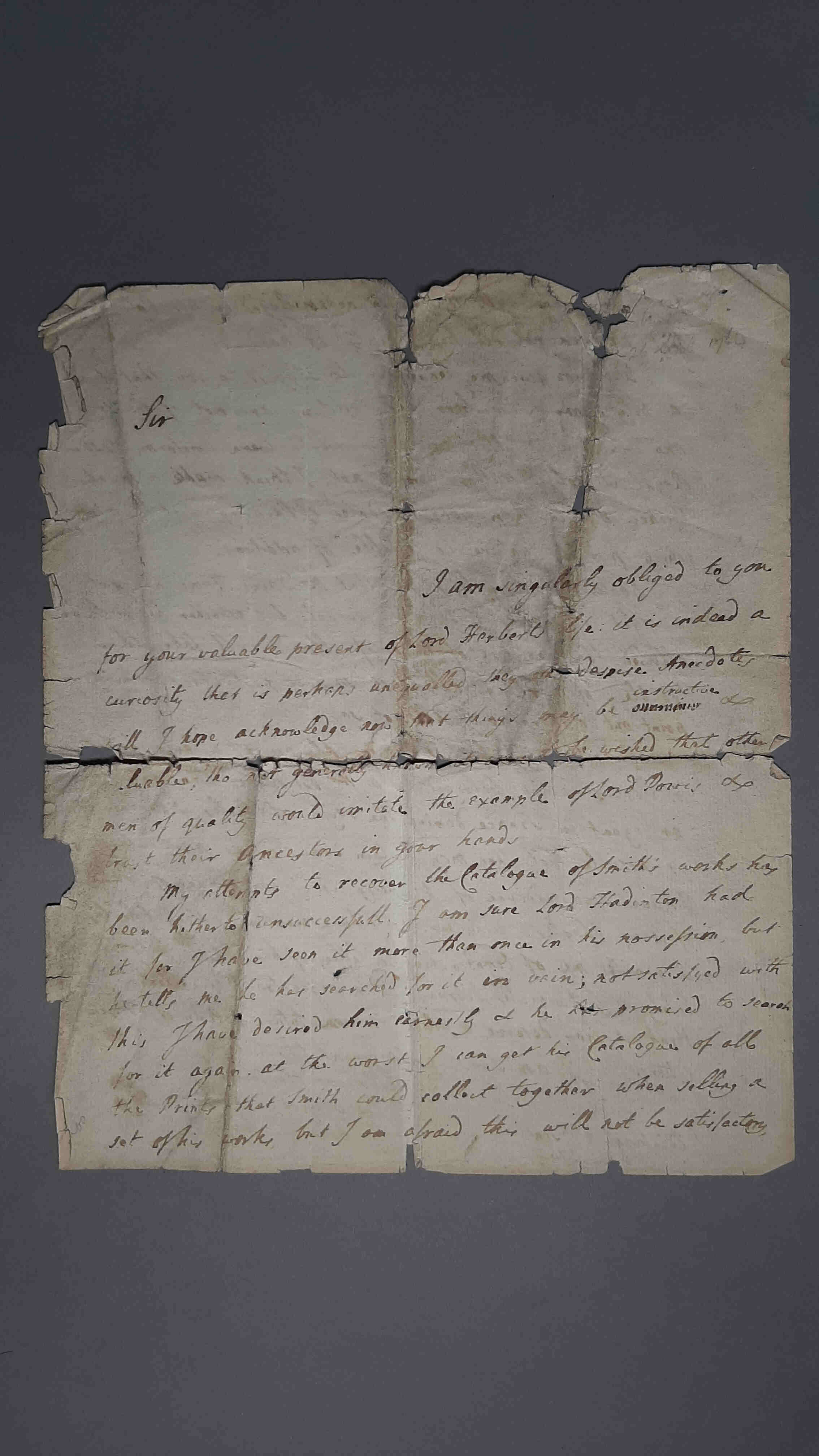 Historic document with structural damage