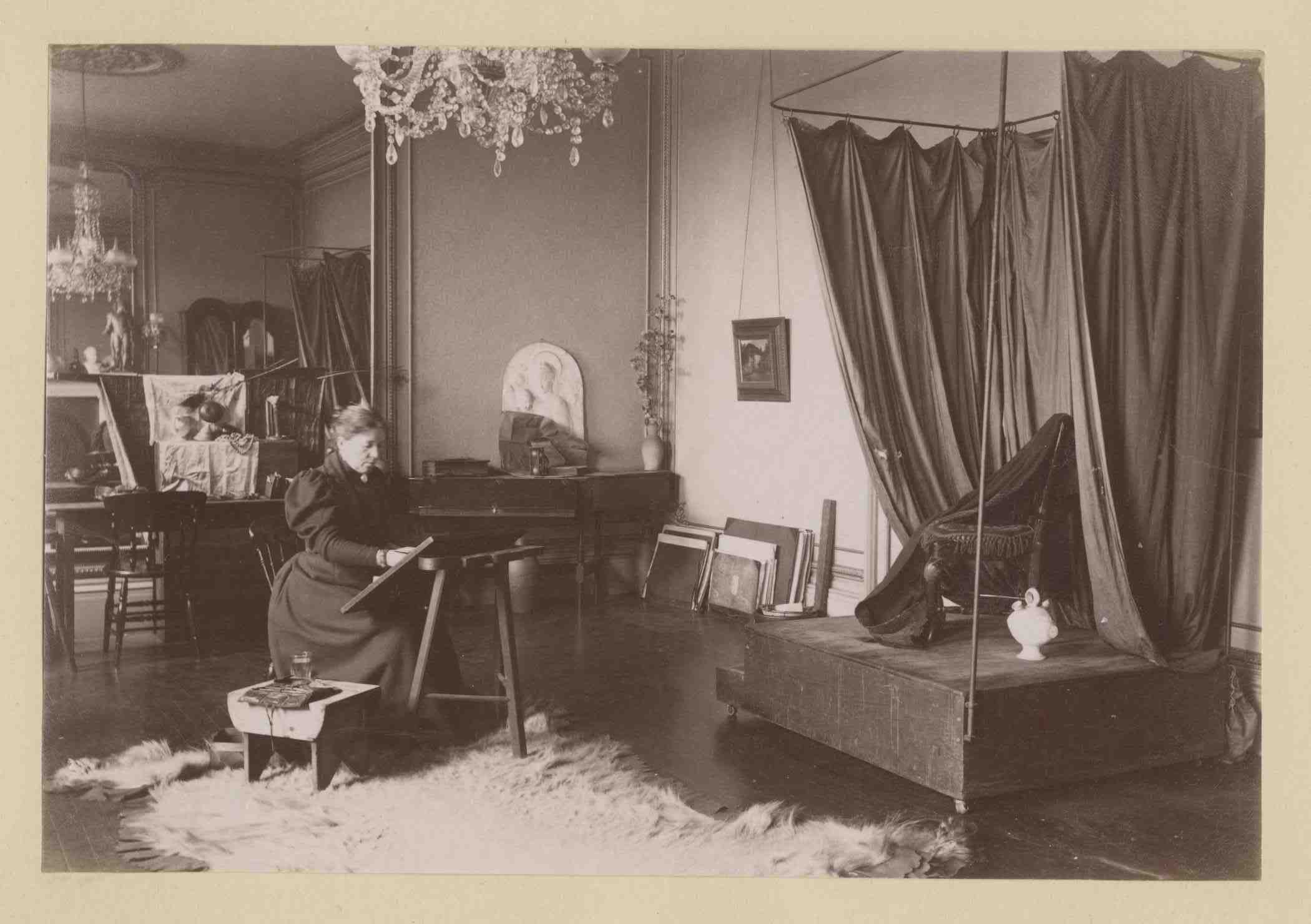 Lauriston photograph album – artist’s studio with man reclining on a travelling couch