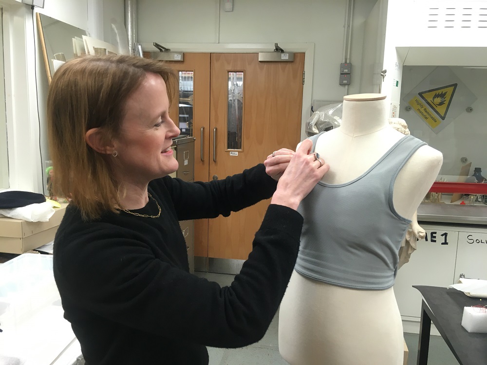 Vicky Garrington mounting a chest binder belonging to a young Trans person for an exhibition at Queensferry Museum © City of Edinburgh Council Museums & Galleries; Museum Collections Centre/ Queensferry Museum