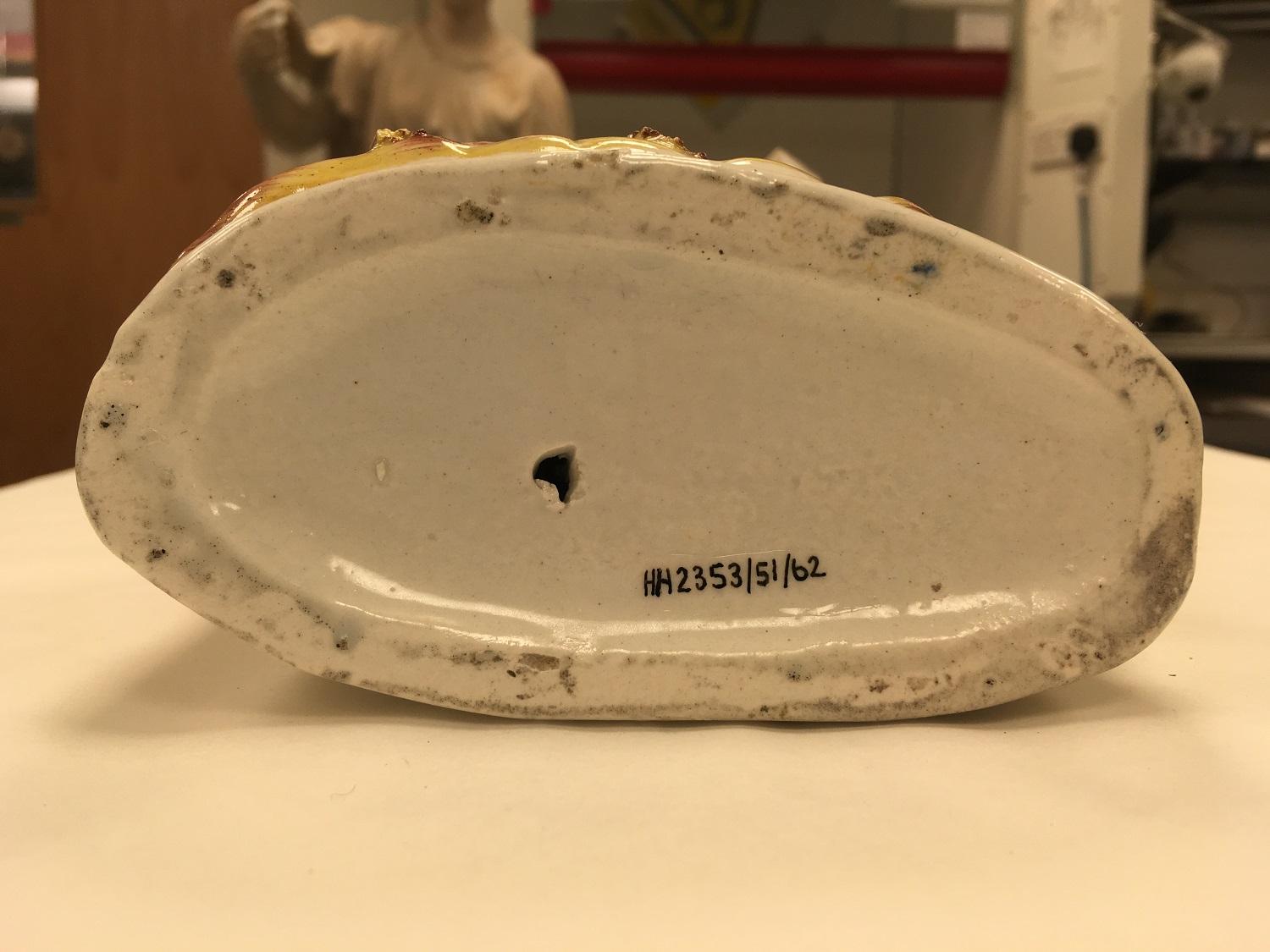 Number in ink on ceramic object