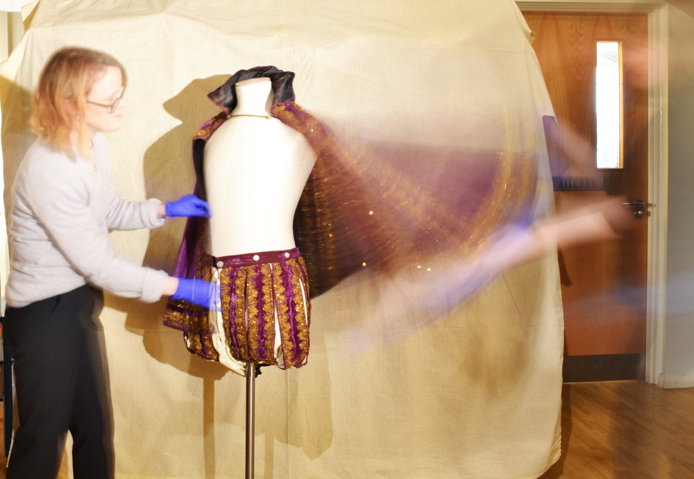 So swishy! A slow exposure of Victoria Garrington (History Curator, M&GE) and I mounting the outfit. © City of Edinburgh Council Museums & Galleries; Museum of Edinburgh