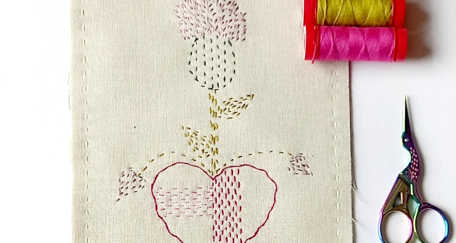 Piece of embroidery showing a thistle