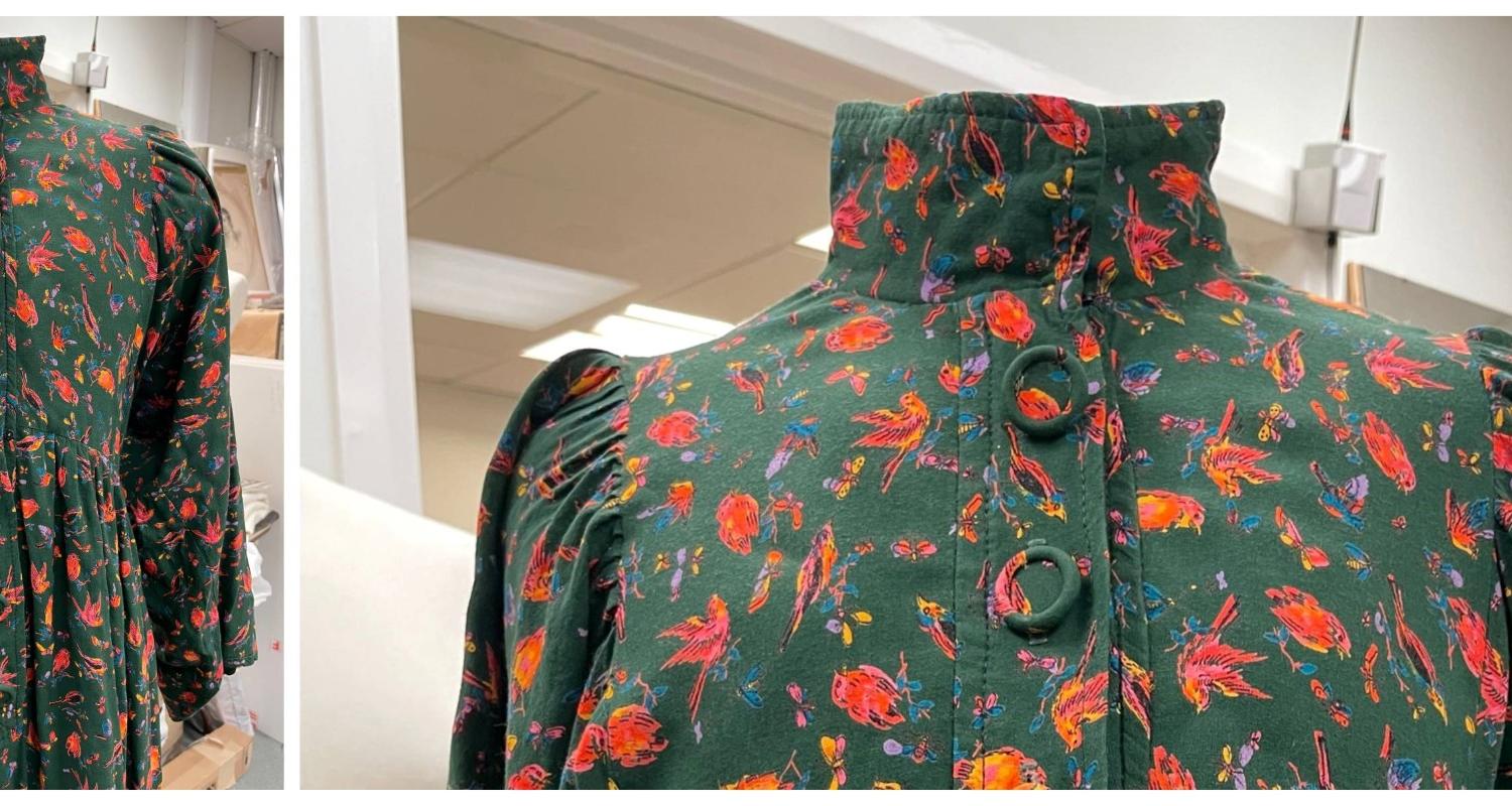Photo of a green dress which features in the historical dress collection in Museums and Galleries Edinburgh. Dress produced and sold by Bus Stop, Edinburgh, mid-1970s, Museums & Galleries Edinburgh