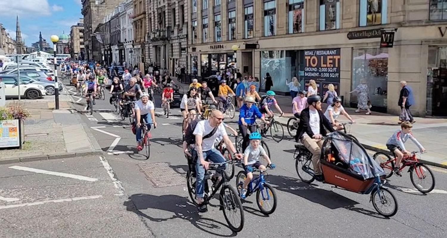 Critical Mass group of cyclists in George St 30 July 2022