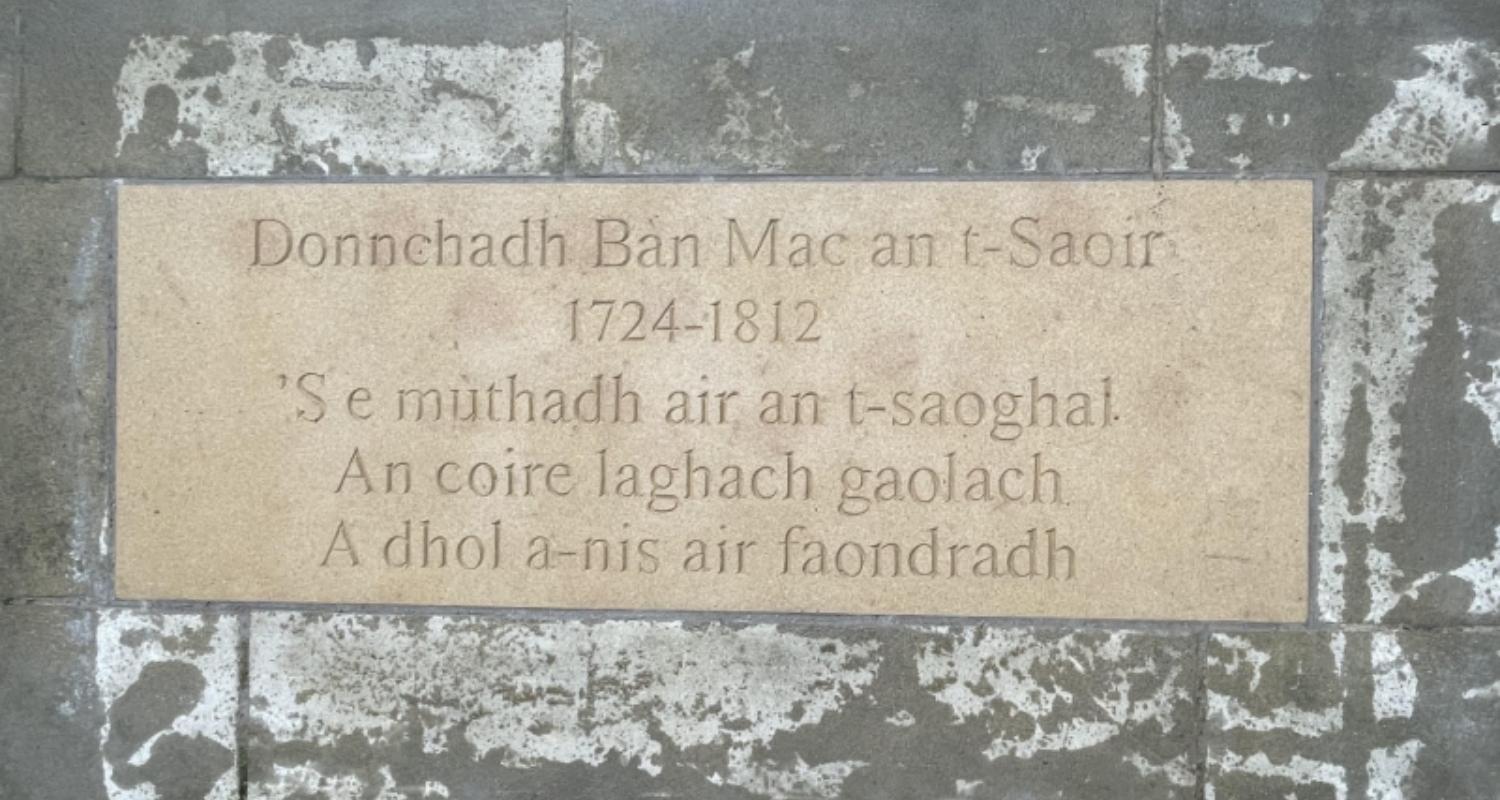 Inscribed flagstone for Gaelic writer Donnchadh Bàn Mac an t-Saoir (anglicised as Duncan Ban Macintyre).