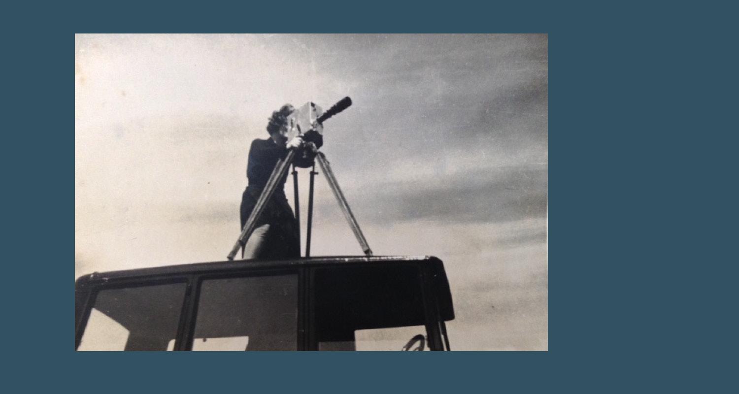 historical  photograph of women behind a camera