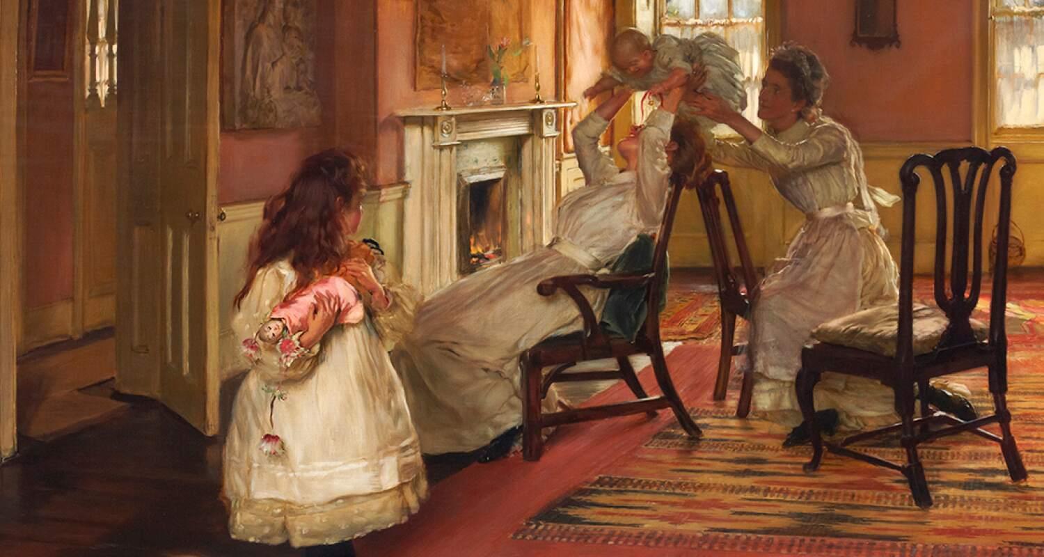 Edwardian family in a room, mother and maid playing with baby, little girl looks on with her doll.