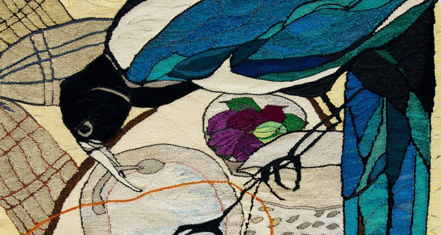Close up of tapestry showing an exotic bird