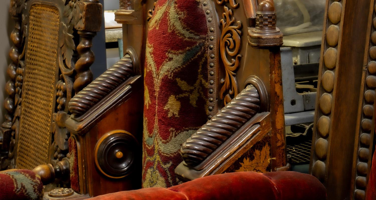 Detail of historic chairs in store at the Museum Collections Centre