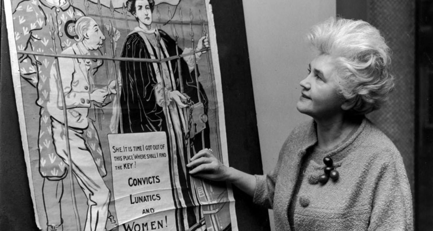 Woman looking at poster