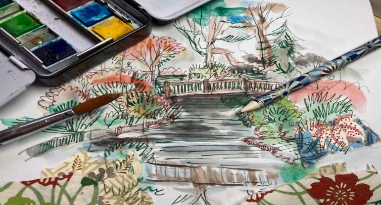 A watercolour sketch of trees, a bridge and a stream 