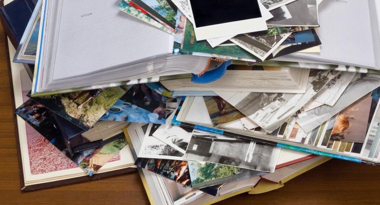 photo of piles of photograph albums