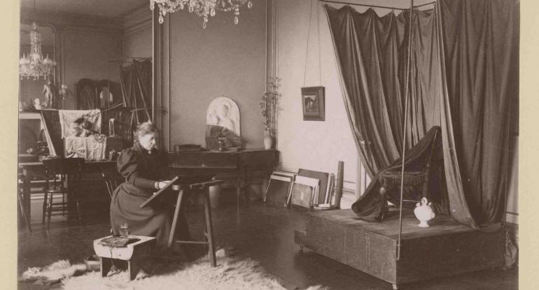 Lauriston photograph album – artist’s studio with woman seated at an easel 
