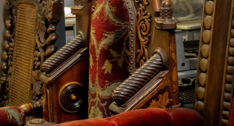 Detail of historic chairs in store at the Museum Collections Centre