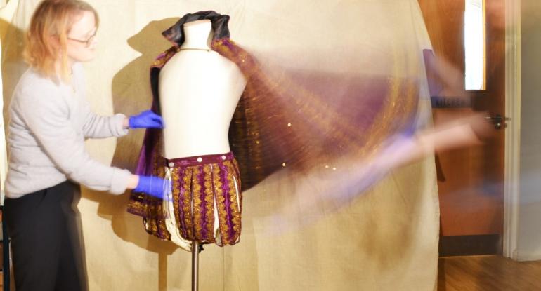 So swishy! A slow exposure of Victoria Garrington (History Curator, M&GE) and I mounting the outfit. © City of Edinburgh Council Museums & Galleries; Museum of Edinburgh
