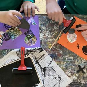 Pupils taking part in a printmaking workshop at the City Art Centre