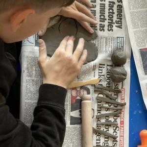 Pupil taking part in a clay workshop at the City Art Centre