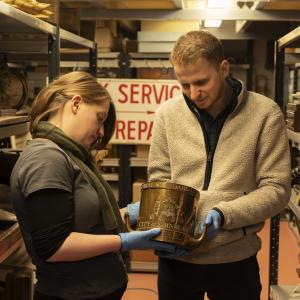 Auld Reekie Retold team member at work in the stores