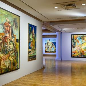 Edinburgh's City Art Centre features multiple paintings displayed on its walls by the artist John Bellany