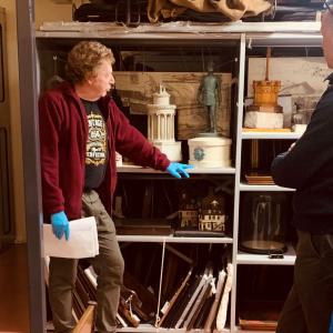 A person leading a tour of the museum collections centre