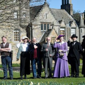 Edinburgh Living History members in costume outside Lauriston Castle.
