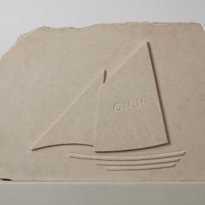 Stone carving with sail boat by artist Ian Hamilton Finlay