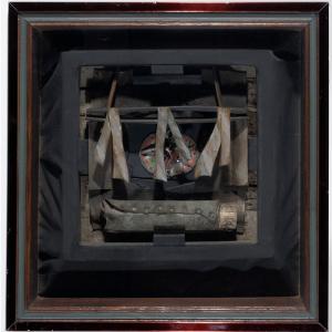 A dark box with items inside 