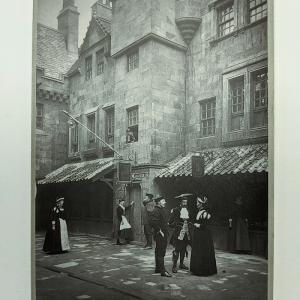 A cabinet card photograph showing a scene from the Old Edinburgh Exhibition in 1886