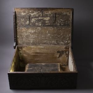 Family bible and documents in open wooden "lectern" box.